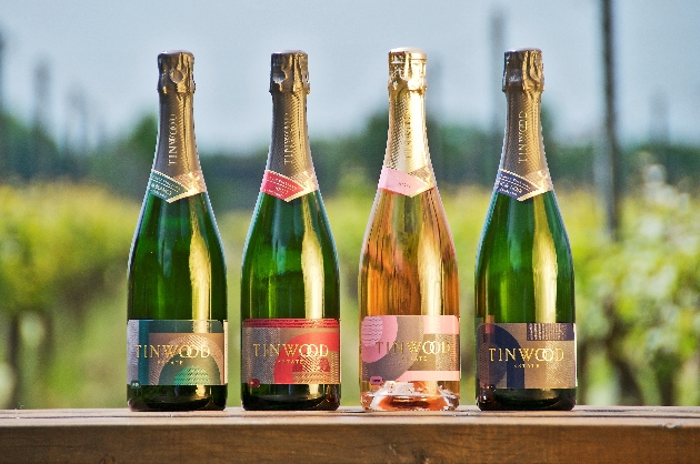 Four bottles of Tinwood Estate sparkling wine