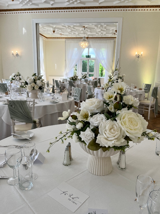 white floral centrepice by Crystal Amor Events