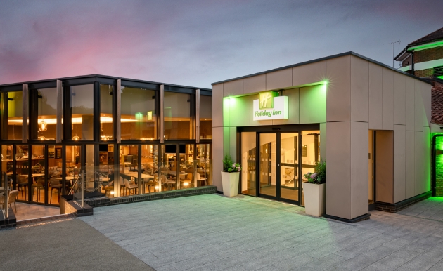 Holiday Inn London Gatwick Worth exterior at dusk