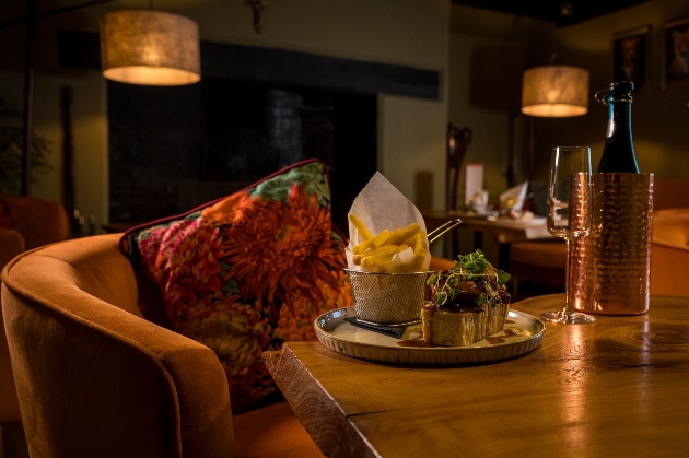 Dining table with meal at TERRA Restaurant Tottington Manor