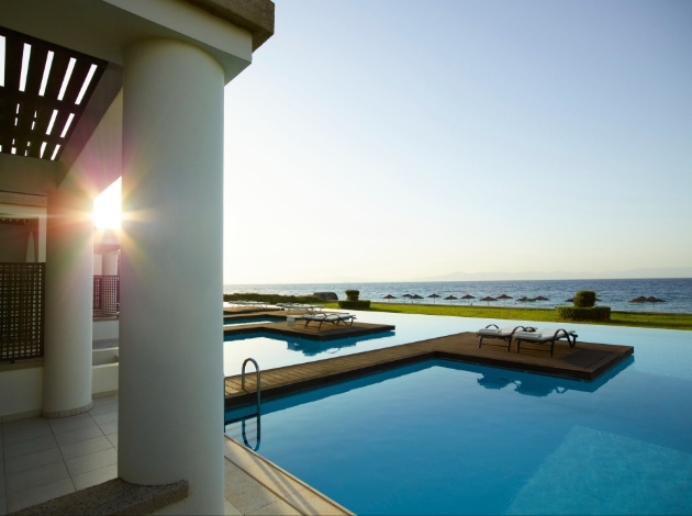 Pool with sun loungers 